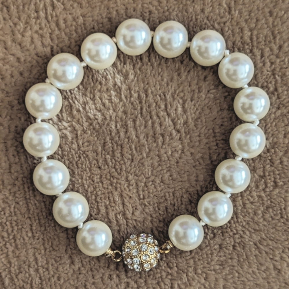 Faux pearl bracelet with rhinestone clasp